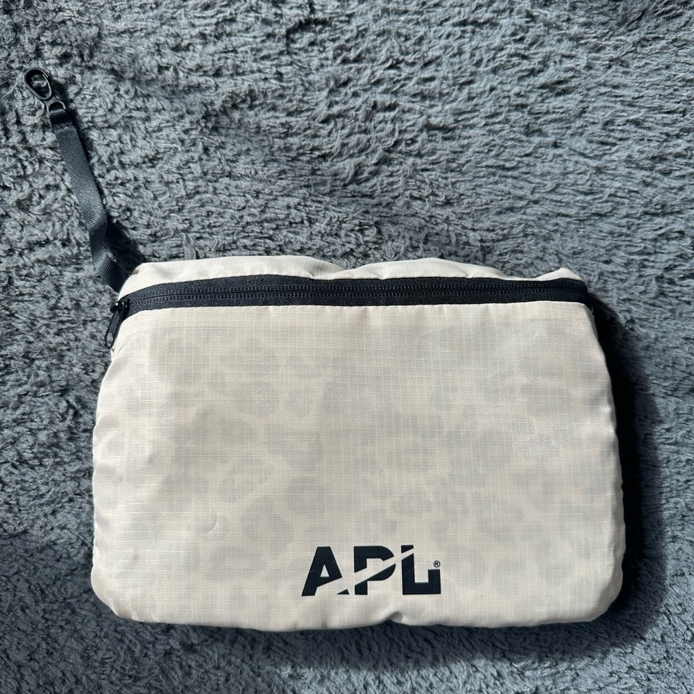 APL packable cream, black and leopard backpack